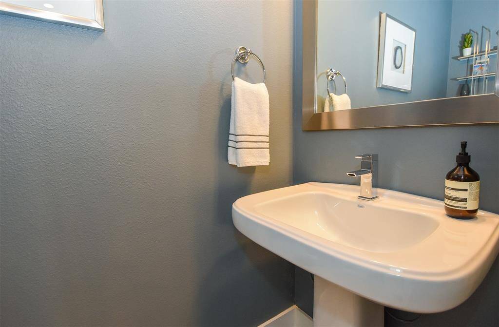 Half bath away from the kitchen.