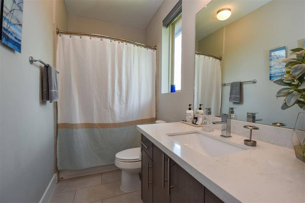 En suite bath in second bedroom.