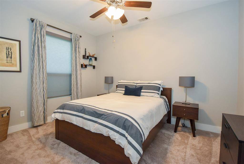 First bedroom is downstairs next to the garage.  Has a en suite bath.