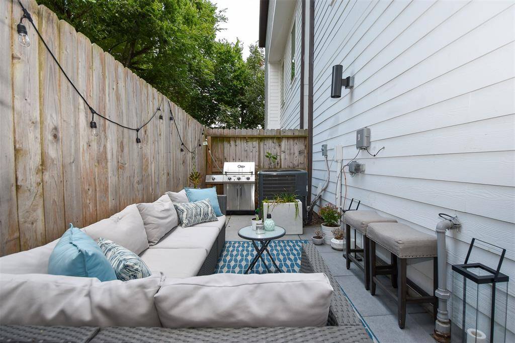 After a long day you can relax in the privacy of your own backyard.  Outdoor couch is being left for future tenants.