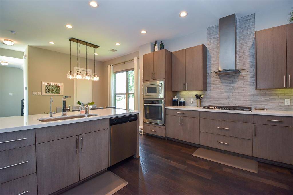 Neutral colors make this modern kitchen a breeze for new tenants to decorate.