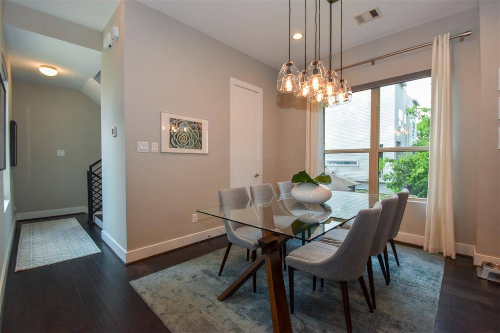 The second floor is open and spacious.  There is ample room for a dining table.