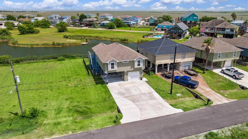 Your new home has a stocked pond in the back yard where you can fish or kayak every day! You can see Dickinson Bay from your balcony.