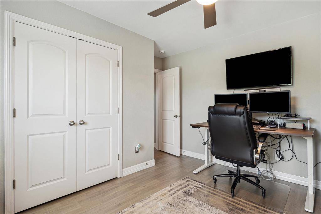 The Murphy bed is to our right and this is your reach-in closet. It has extra shelves built out, but if you prefer to have hanging rods, just say the word and the seller can restore this closet to its' original configuration with two rods.