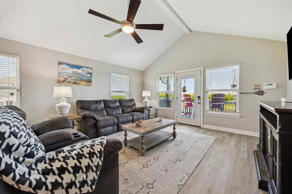 Let's go back through the living room and see what's outside for you to enjoy. It's a light and bright home that is ready for new owners.