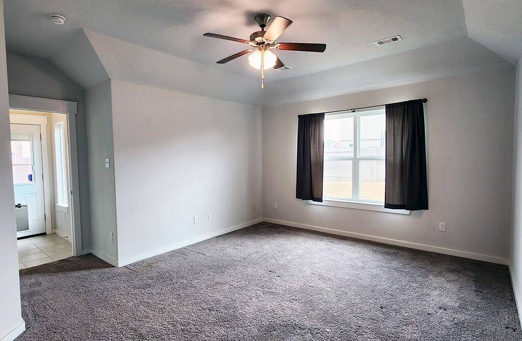 Primary Bedroom privately located in the back of home