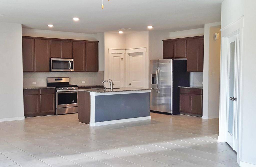 Island Kitchen with SS Appliances