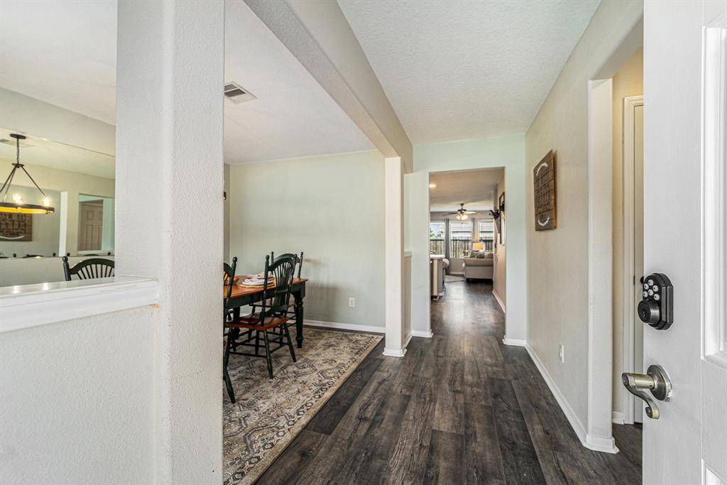 Luxury Vinyl Plank throughout most of downstairs.