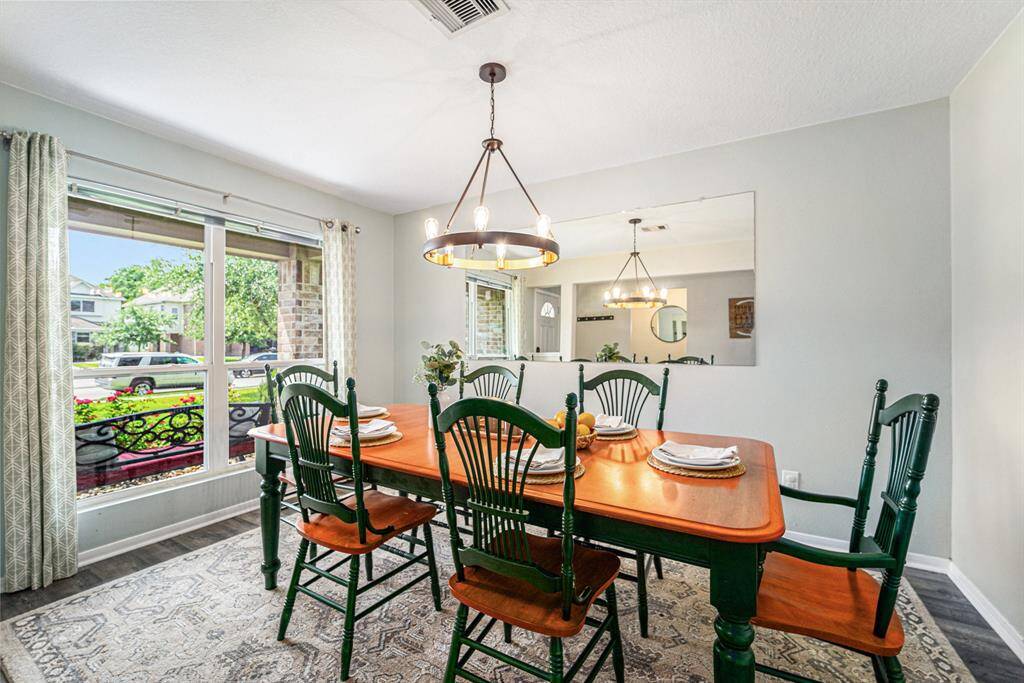 Formal Dining near entry with updated lighting