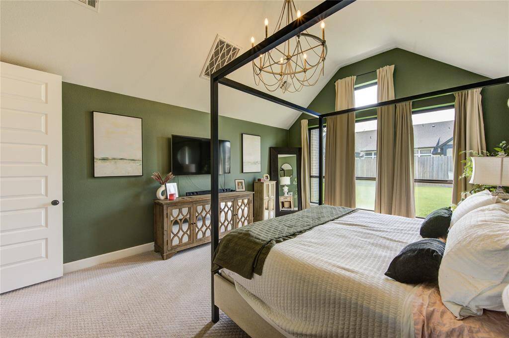 Primary bedroom overlooking the back yard space