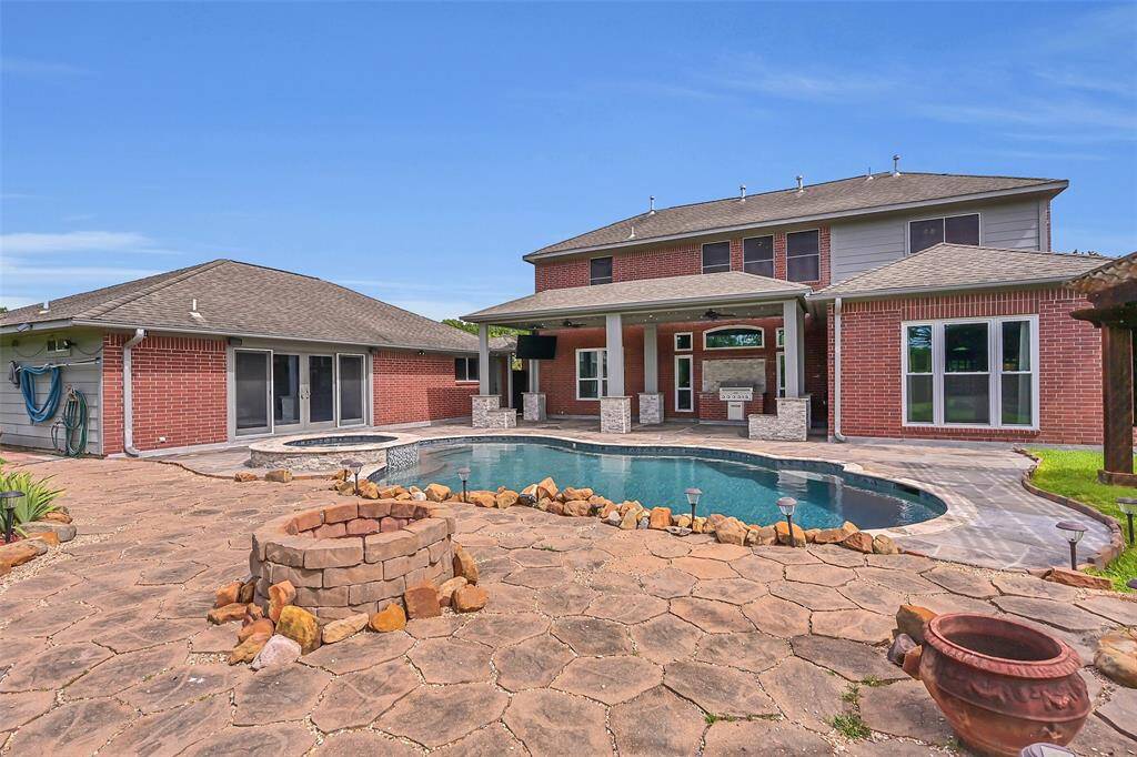 Enjoy evenings by the built-in firepit and take advantage of the versatile 15x11 poolside cabana, located just off the garage—perfect as a home gym, game room, or guest retreat.