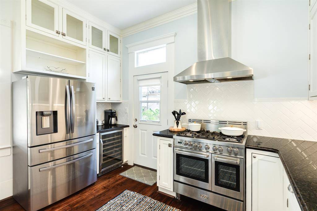 Large Commercial Gas Stove with Stainless Hood and wine refrigerator
