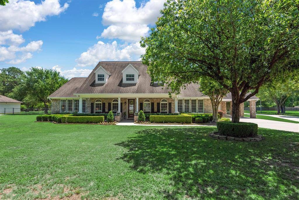 Welcome to this charming custom home set on 1.5 acres, featuring a large front porch, mature trees, a spacious front yard, and loads of curb appeal!