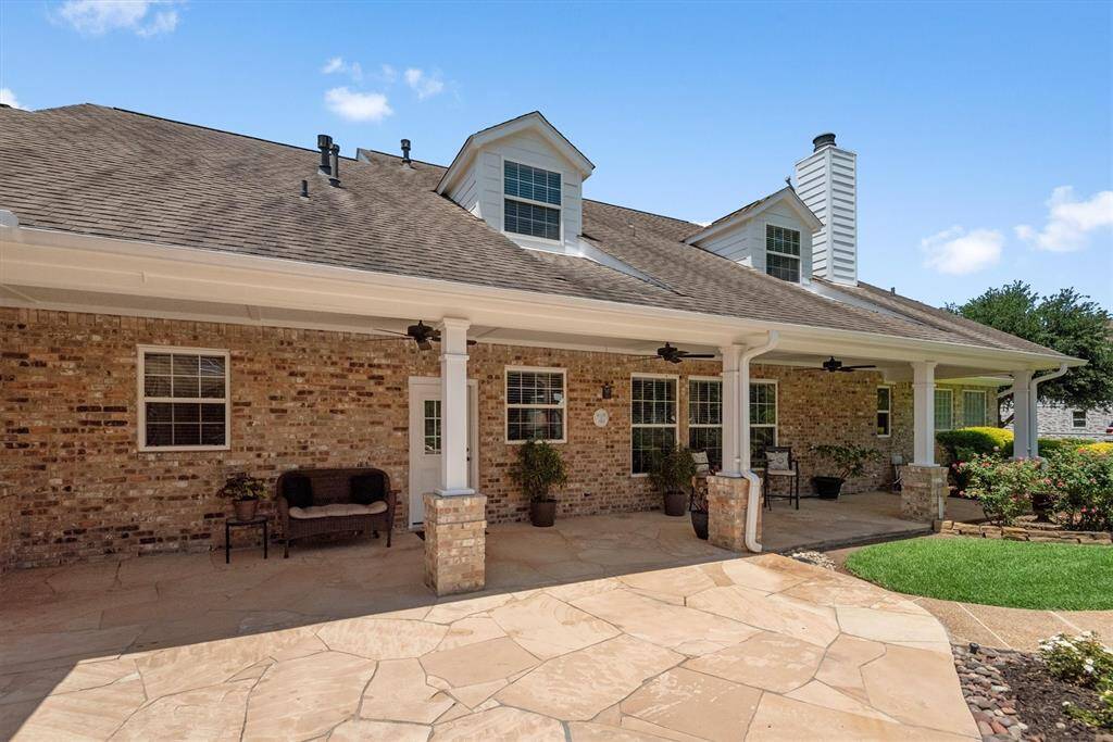 Relax or entertain on the expansive covered back patio overlooking the pool and yard—perfect for outdoor dining, morning coffee, or weekend gatherings.