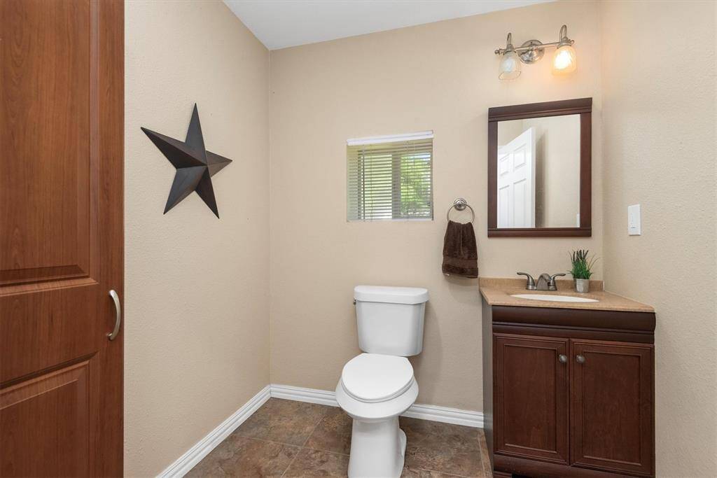 Convenient half bath located inside the barn.