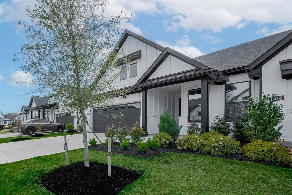 Charming, modern home with stunning curb appeal. Features a sleek design, manicured landscaping, and a welcoming entrance. Perfect for those seeking contemporary living in a serene neighborhood.