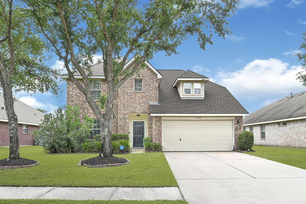 Your dream home awaits! This charming brick house features a spacious layout, lush landscaping, and a welcoming atmosphere.