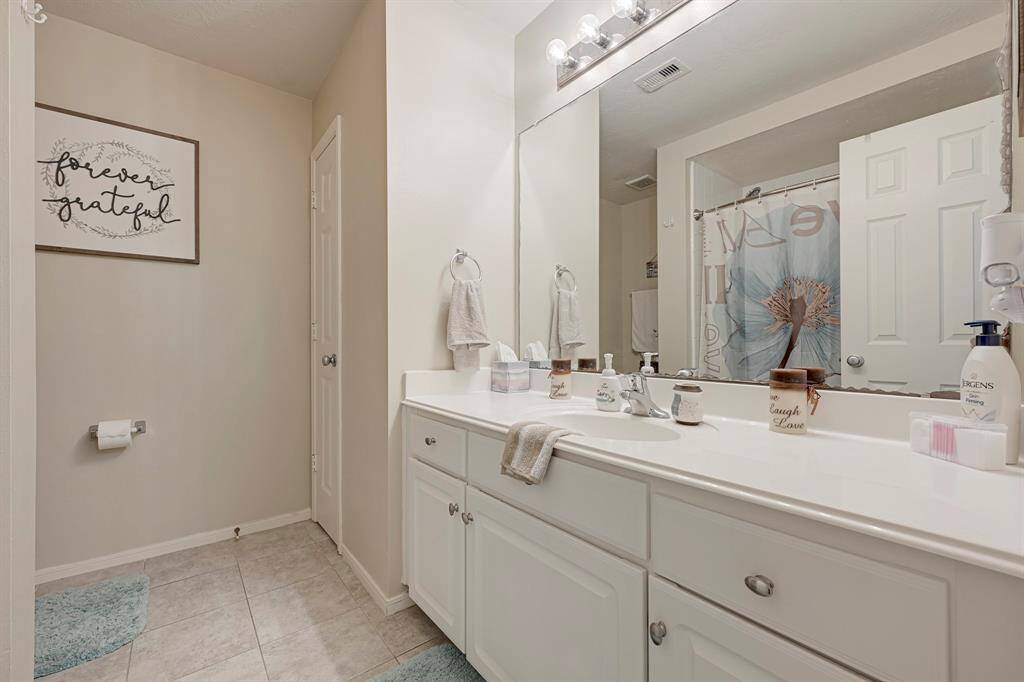 Cozy and inviting, this third bedroom features ample natural light and perfect for relaxation or hosting guests.