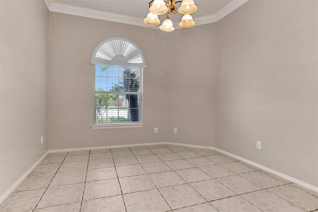 Arched window in the study/home office creates a light and bright workspace