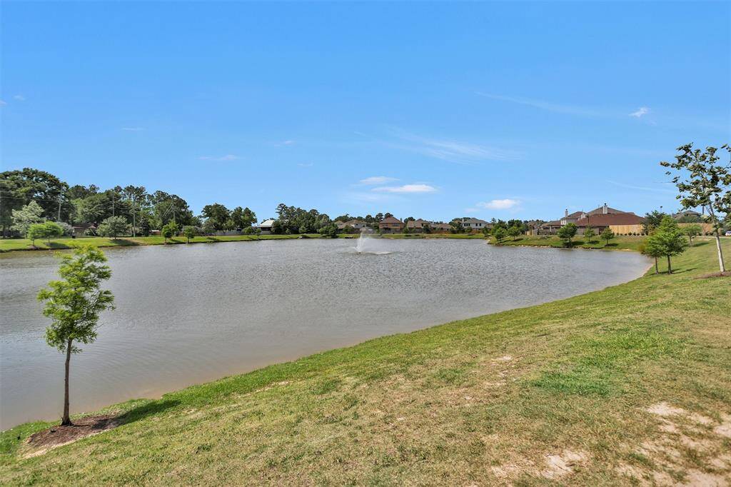 A different perspective of the neighborhood lake, showcasing the stunning water feature