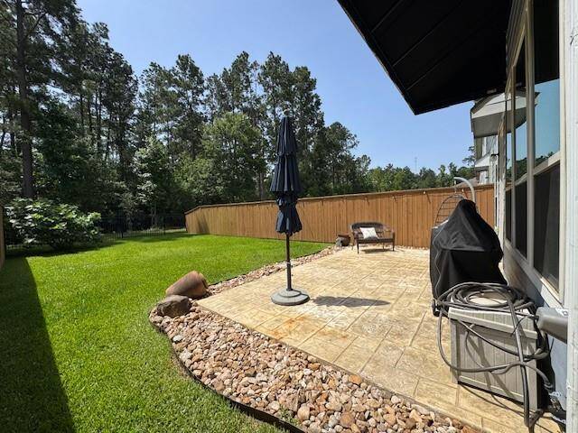 Extended back patio is perfect for entertaining and family time.