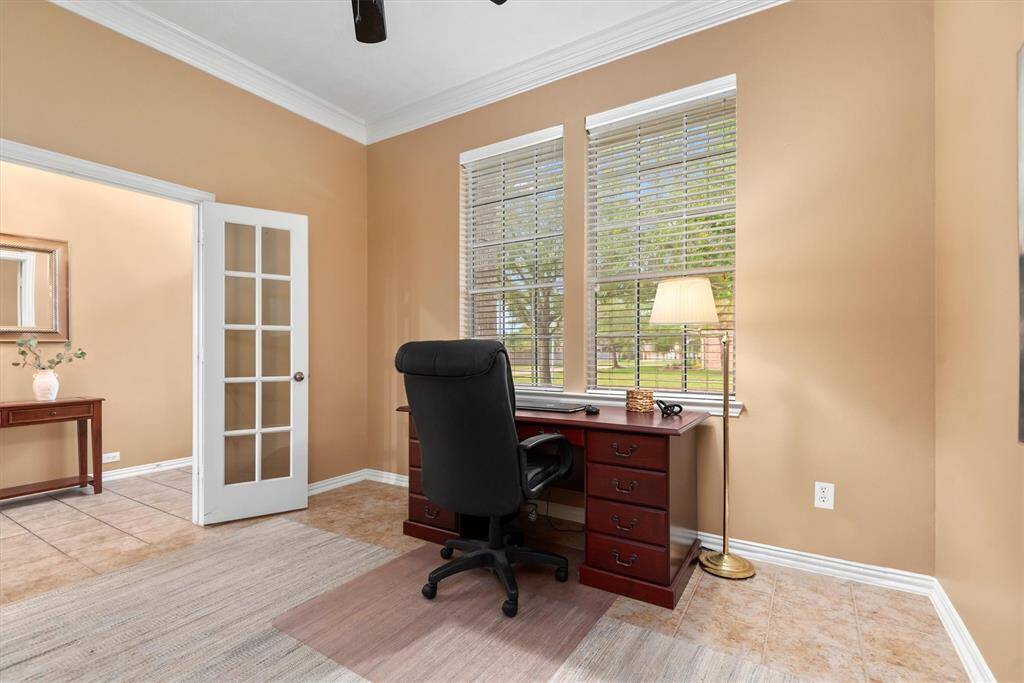 Located at the front of the home is the spacious office which is large enough for 2 desks.