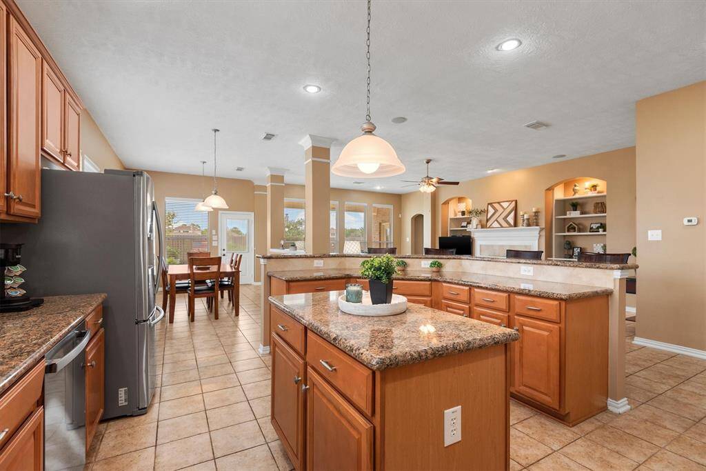 Truly the heart of the home, this kitchen is open to the living area and breakfast room.  This is a perfect layout for entertaining and keeping everyone connected.