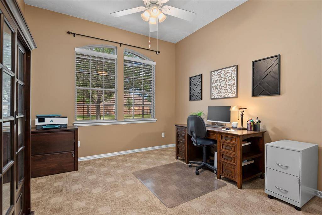The first of 3 secondary bedrooms is located at the front of the home.  All the secondary bedrooms are large enough for at least a queen sized bed and furnishings.
