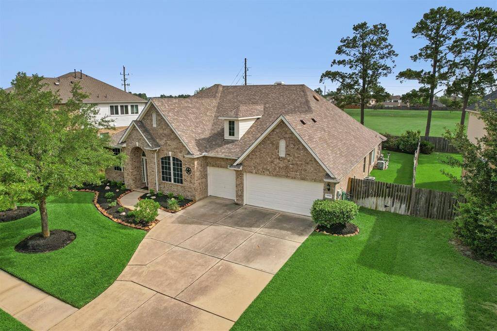 The home is nestled on a spacious lot that backs to peaceful greenspace. You have tranquil views and a refreshing breeze in the backyard. The 3 car across garage offers ample parking.