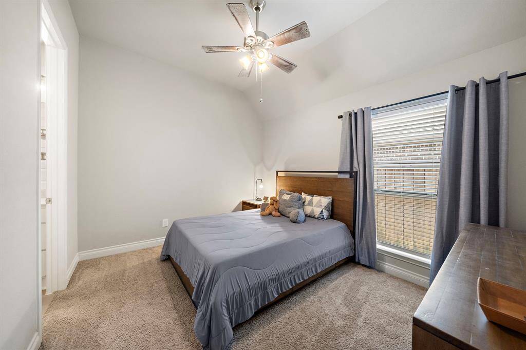 A private guest suite with its own bath ensures comfort for visitors.