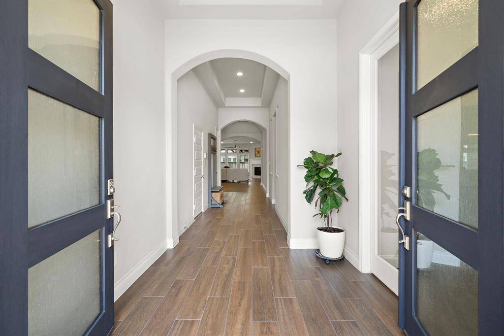 From the moment you step through the double front doors, you're greeted with charm, light, and spacious elegance.