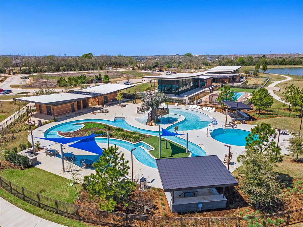 Dragonfly Park with lazy river, pools, gym and activity center.