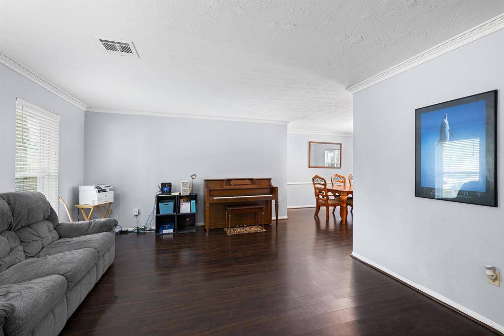 LIVING ROOM - This room is at the front of the home.  It is designed to be the formal living area, but could be used as an office space, playroom, music room or whatever you need it to be.