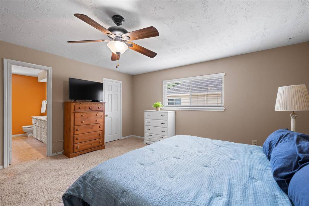 PRIMARY BEDROOM - Has large walk-in closet.