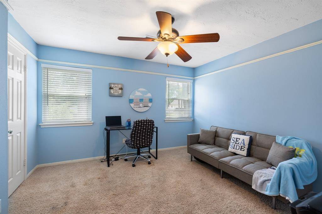 BEDROOM 3 - This room also has a walk-in closet and faces the front of the home.