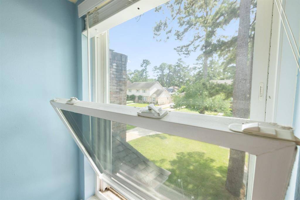 DOUBLE-PANED WINDOWS - Home has updated windows that can be opened inside for easy cleaning.