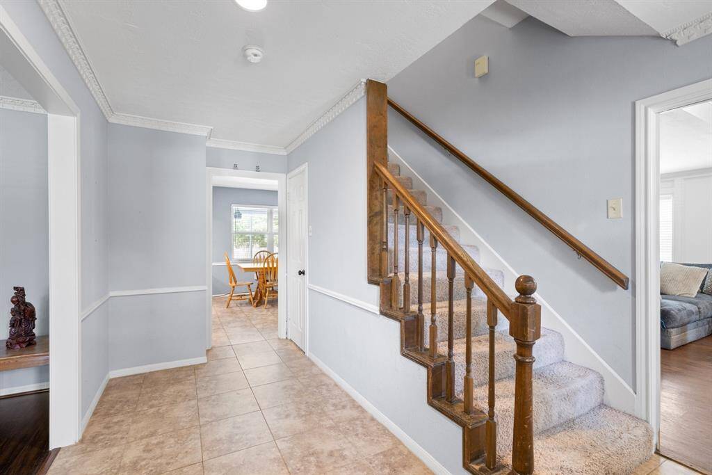 ENTRY - The formal living and dining rooms are on the left, and the family room is on the right.  Kitchen and breakfast room are straight ahead as you enter the home.