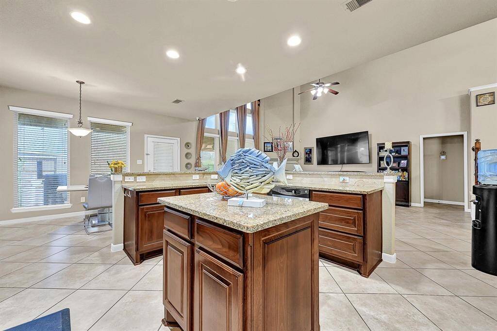 Kitchen with granite counter top & Stainless steel appliances
