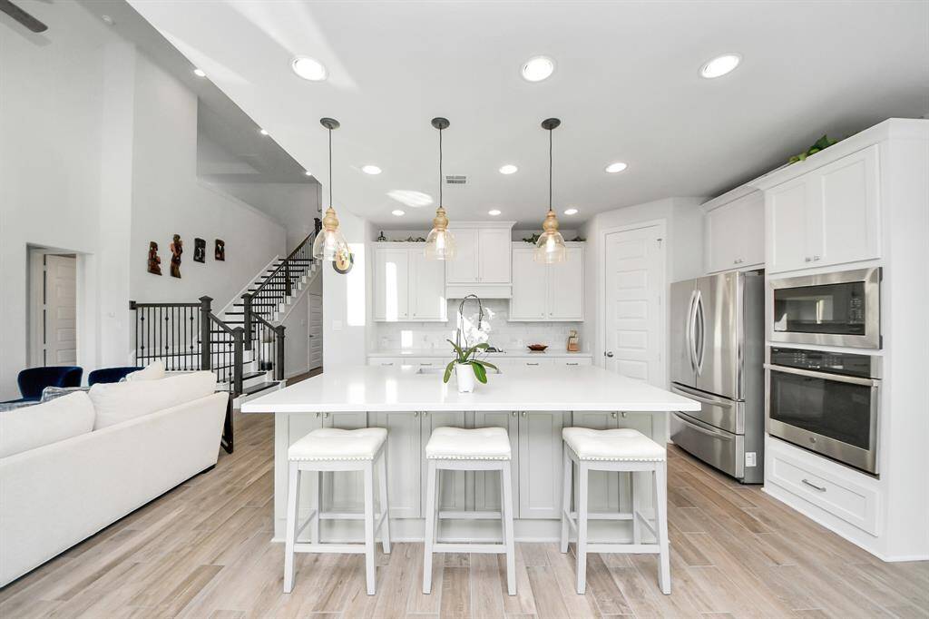 The kitchen, the heart of the home, has lots of functional space.