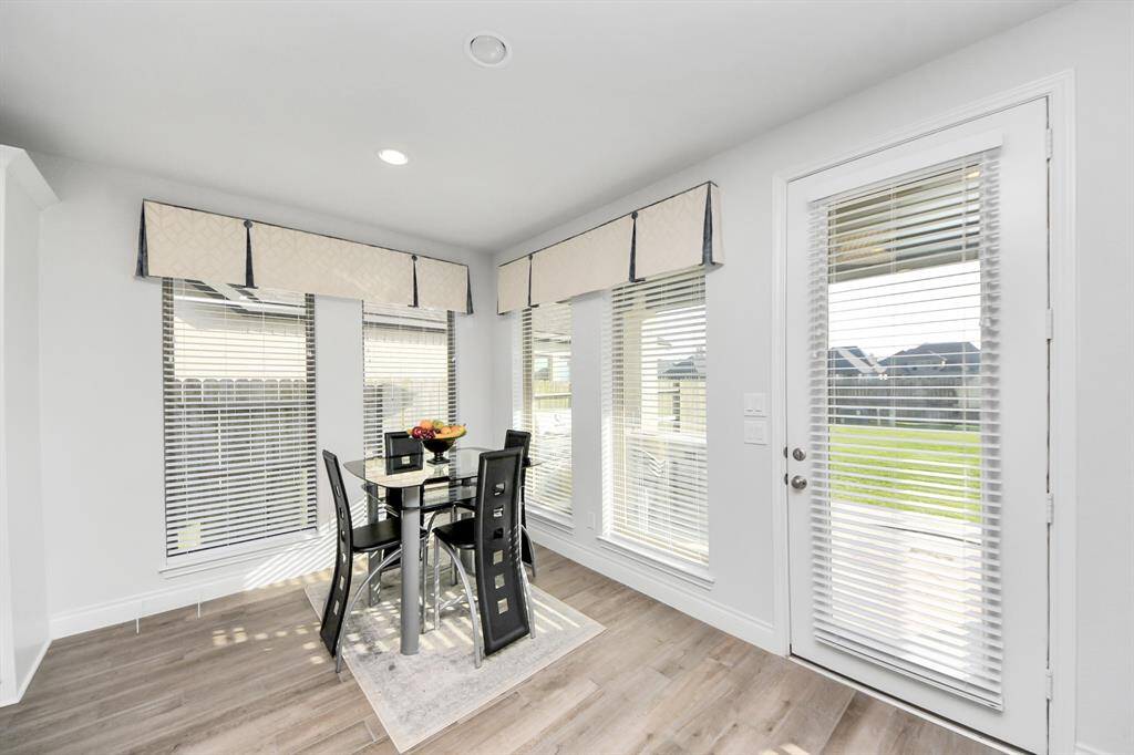 Enjoy seating at the kitchen island or take in the view of the outside at the breakfast area.