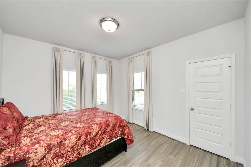 Bedroom #4 is located on the second floor of the home with lots of windows!