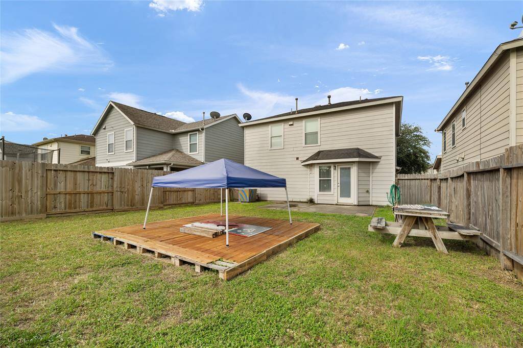 Imagine summer barbecues, peaceful mornings with coffee, or weekend gatherings in this spacious backyard—your outdoor retreat waiting to happen.