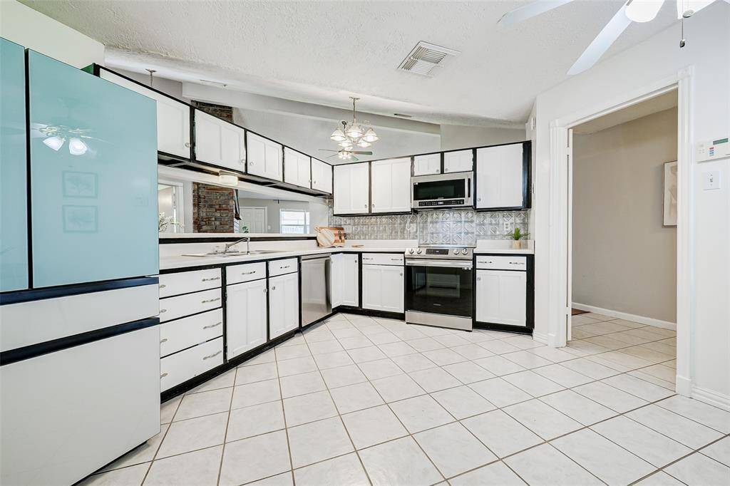 The kitchen has an opening to the dining room, making entertaining a breeze.