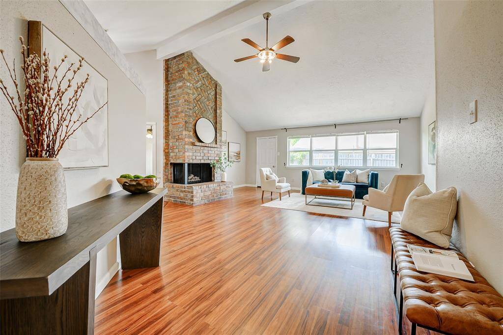 Hallway into the living area has plenty of room for a bench and hallway table.