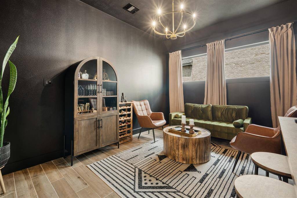 This versatile room easily transforms into a private office, offering ample space for your furniture and work needs. Large picture windows flood the area with natural light, creating an inviting and productive environment.