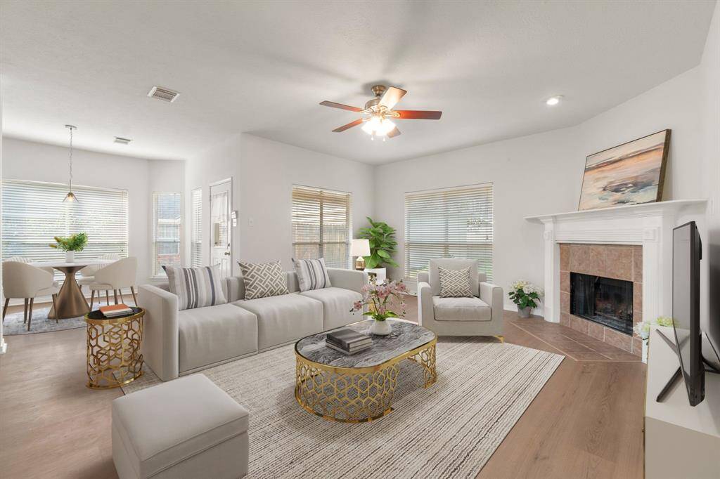 Living room and breakfast area with virtual staging