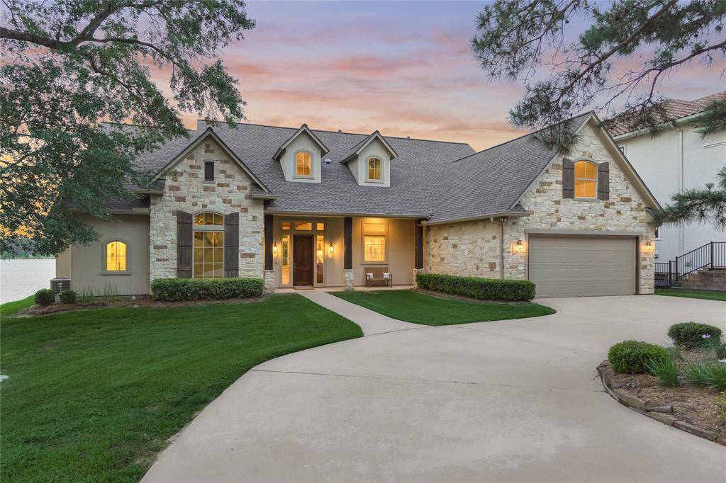 19926 Gemstone Drive is a custom built lakefront home designed by sought after Mark Todd  Architects and built by J. W. Neathery.