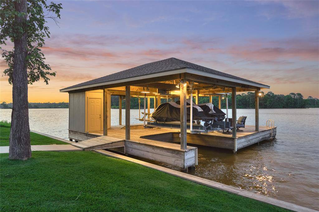 Impressive boat house with storage for water toys.