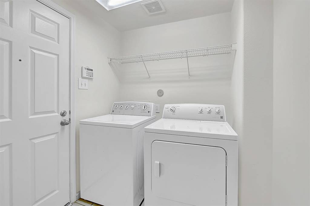 Indoor laundry room (washer and dryer stay with the home).