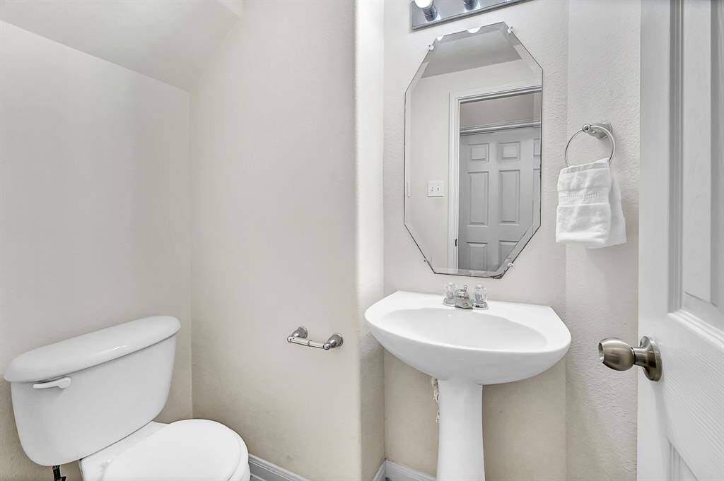 Half bath conveniently located off of the living room.